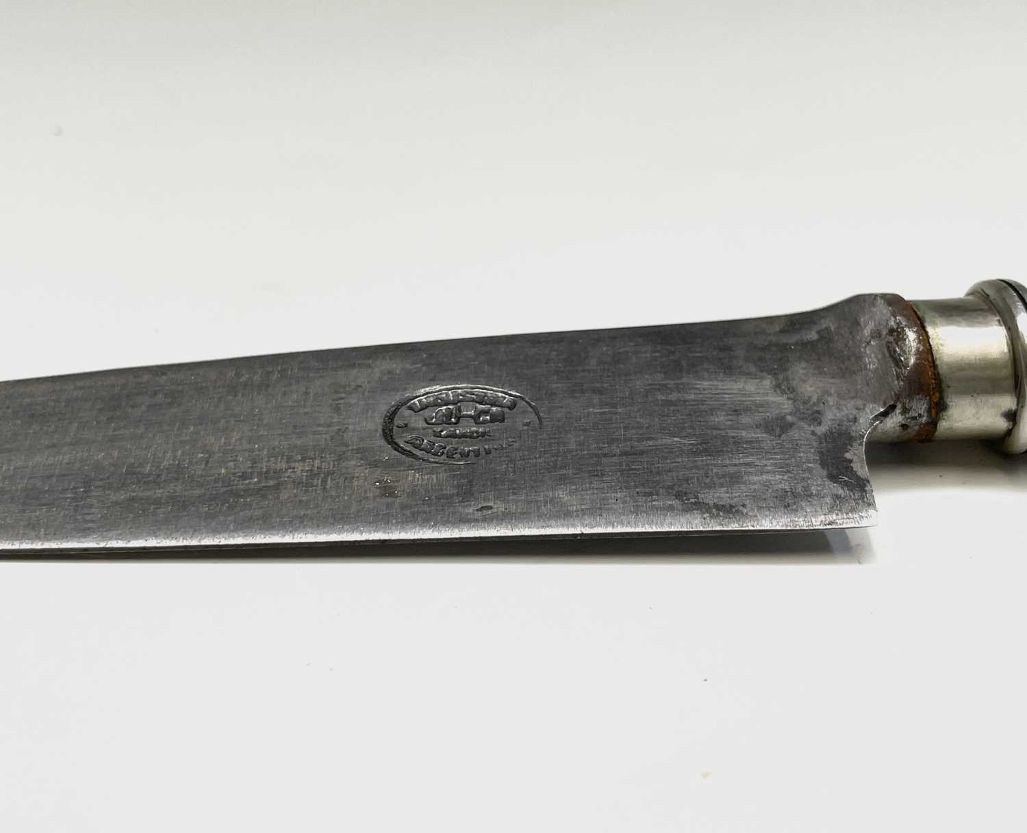 An Argentinian gaucho knife, mid 20th century, with spiral white metal grip and similarly - Image 2 of 9