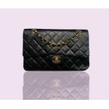 Chanel. Vintage shoulder bag. Classic Double Flap Bag. Black quilted lambskin leather with