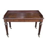 An early Victorian mahogany tray-top writing table or washstand, in the Gillows taste, fitted two
