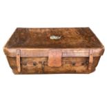 A leather trunk, 19th century, with interior lift-out tray and slatted wooden base, with original