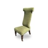 A Victorian mahogany prayer chair, with padded back and seat on turned tapering front legs, height