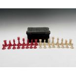 A mid 19th century Jacques London red-stained and natural ivory Staunton chess set, the natural