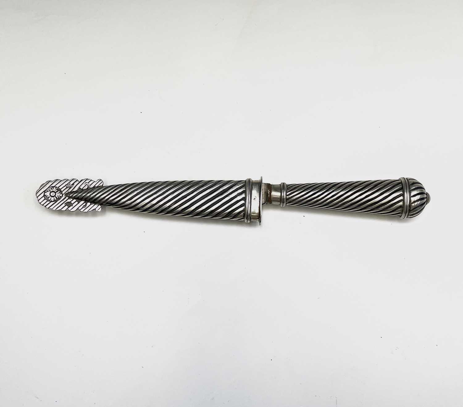 An Argentinian gaucho knife, mid 20th century, with spiral white metal grip and similarly - Image 5 of 9