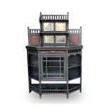 A Victorian ebonised Aesthetic movement display cabinet, with raised mirror back set burr wood