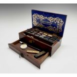 A Winsor & Newton mahogany artists travel box, 19th century, with removable tray for watercolors and