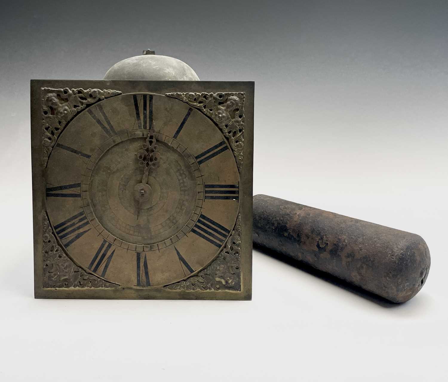 An early 18th century brass thirty-hour wall clock movement, the 9" (23cm) square dial unsigned