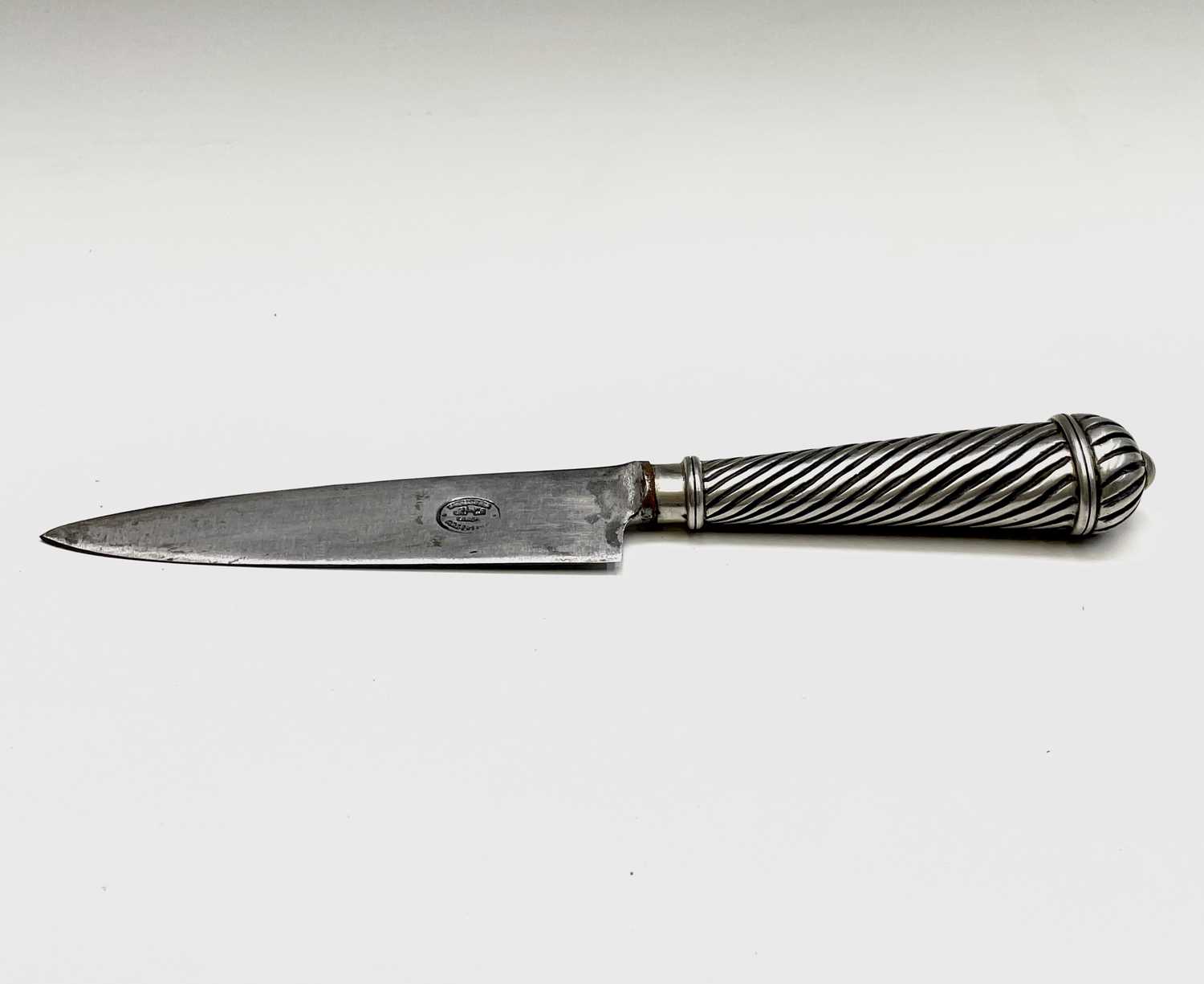 An Argentinian gaucho knife, mid 20th century, with spiral white metal grip and similarly - Image 6 of 9