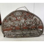 An ethnic carved large plaque, decorated with figures and animals in a crocodile boat, with