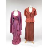 Two 1930’s evening gowns - a rust coloured taffeta dress with bolero bearing Bourne &