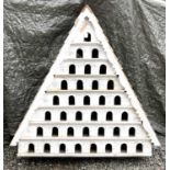 A large birdhouse, with shingled roof and multiple white painted sections, height 133cm.
