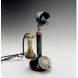 A brass, painted metal and bakelite candlestick telephone, stamped PX150, height 33cm.