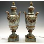 A pair of French Louis XVI style blue veined marble ormolu mounted table lamps, circa 1900, fitted