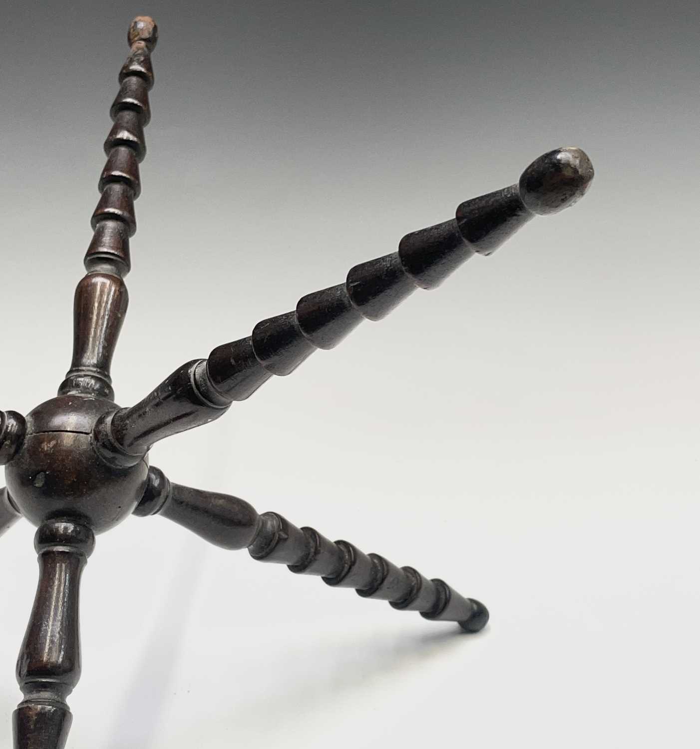 A turned mahogany cat, 19th century, with central sphere and ridged spindles, height 28cm. - Image 2 of 6