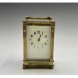 A French brass cased carriage clock, early 20th century, on turned feet, height 12.5cm.