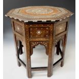 A Hoshiarpur folding octagonal occasional table, North India, circa 1880, with bone floral decorated