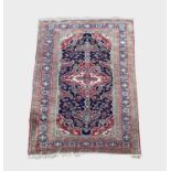 An Ardebil rug, North West Persia, circa 1930's, the indigo field with a madder and ivory pole