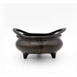 A Chinese bronze censer, 19th century, Xuande six character seal, with three stile feet, height 7cm,