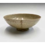 A Chinese celadon bowl, Ming Dynasty, diameter 16cm, height 6.5cm. Provenance:The Chris Davis