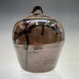 A Trevor Corser lidded pot, impressed makers mark to base, height 23cm