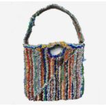 PONKLE (1934-2012) A bag made from recycled plastic bags With interwoven 'P' and dated '99