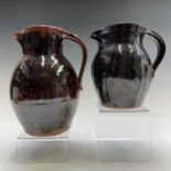 Two Trevor Corser brown glazed jugs, impressed makers mark to base, height range from 17.5 to 22cm