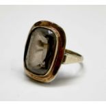 A stylish gold ring set with a brown topaz Size J 3.5gm The head 18x13.8mm