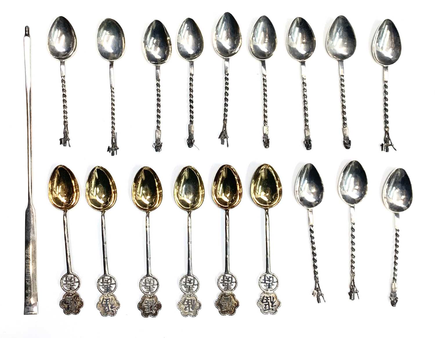 A set of 12 African native silver coffee spoons with figure finials 59.7gm, six Chinese silver