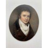 Portrait MiniatureA finely painted portrait on ivory of a gentleman in brown coat and white
