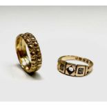 A Victorian 18ct gold ring set with two diamonds (central stone missing) Birmingham 1882 3.9gm