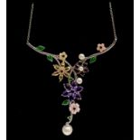 A naturalistic necklace with entwined flowering and fruiting enamelled branches of platinum-plated