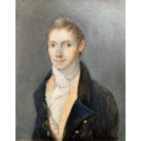 Portrait miniaturePortrait of a fair young gentleman in dark blue coat and white cravat.