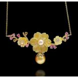 A voluptuous silver-gilt necklace with a golden South Sea pearl and pink sapphires amongst carved