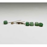 A pair of 9ct gold mounted jade cufflinks Birminghan 1987 Head diameter 13.2mm and a matching 9ct