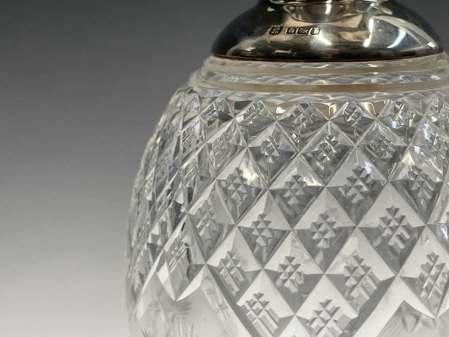 A good cut glass ovoid footed decanter with plain silver shoulder neck and quatrefoil rim by James - Image 3 of 8