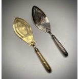 A silver-gilt fish slice by William Abdy London 1790 the filled silver handle by RT together with