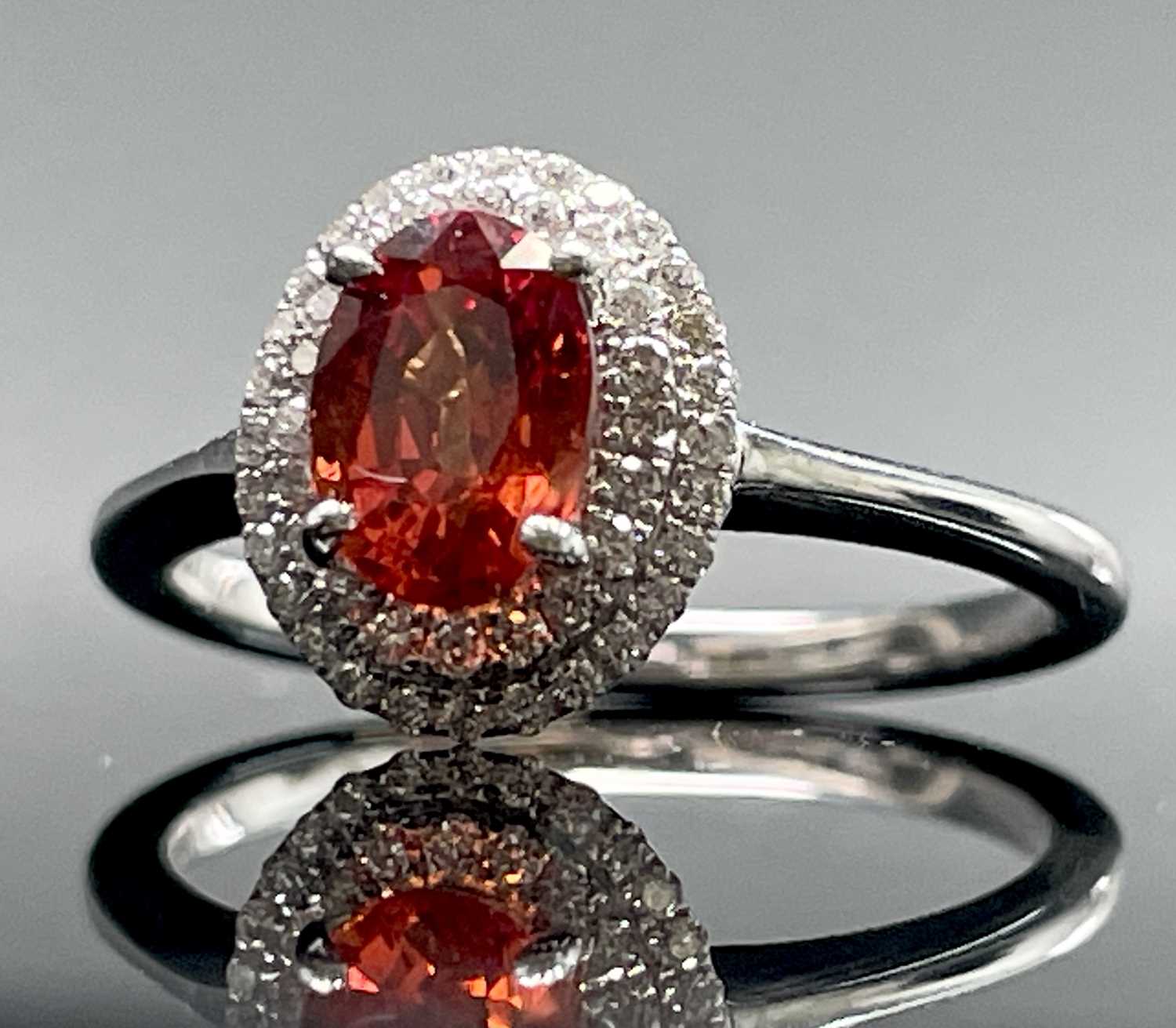 A very rare Iliana golden and orange oval sapphire of approximately 1.5 ct set in an 18ct white gold