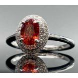 A very rare Iliana golden and orange oval sapphire of approximately 1.5 ct set in an 18ct white gold