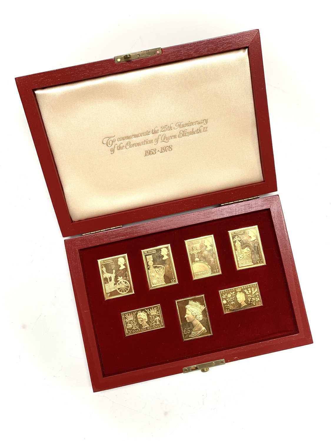 A cased set of Coronation silver-gilt replica stamps