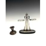 An Art Deco silver manicure stand with engine turned decoration by Bravingtons Ltd, Birmingham 1935,