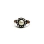 A Victorian gold ring with a pearl and mine cut diamond cluster Size N/O 3.4gmCondition report: Good