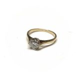 An 18ct yellow gold solitaire ring set a 0.66ct certificated diamond. The Anchorcert report gives it
