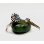 A jade ring Size P and two gold rings set with stones Size S and TCondition report: The jade ring is