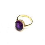 An 18ct gold ring set with amethyst Size L 3.5gmCondition report: The stone has very few scratches