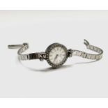 A ladies Tudor Royal Rolex wristwatch with 9ct white gold bracelet and diamond-set bezel, the case