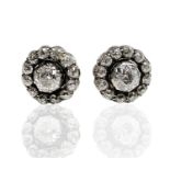 A pair of diamond cluster earrings, each head 10mm diameter and each set an old European cut diamond
