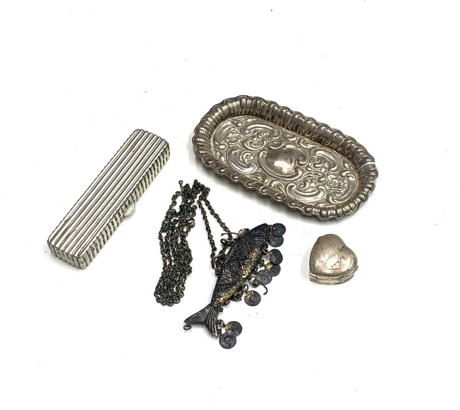 An Edwardian silver heart shape pillbox by Adie & Lovekin Ltd Birmingham 1902 and three other