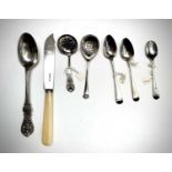 An Elkington Manchester Dog Show silver spoon, a smaller Darlington Dog Show spoon, four other