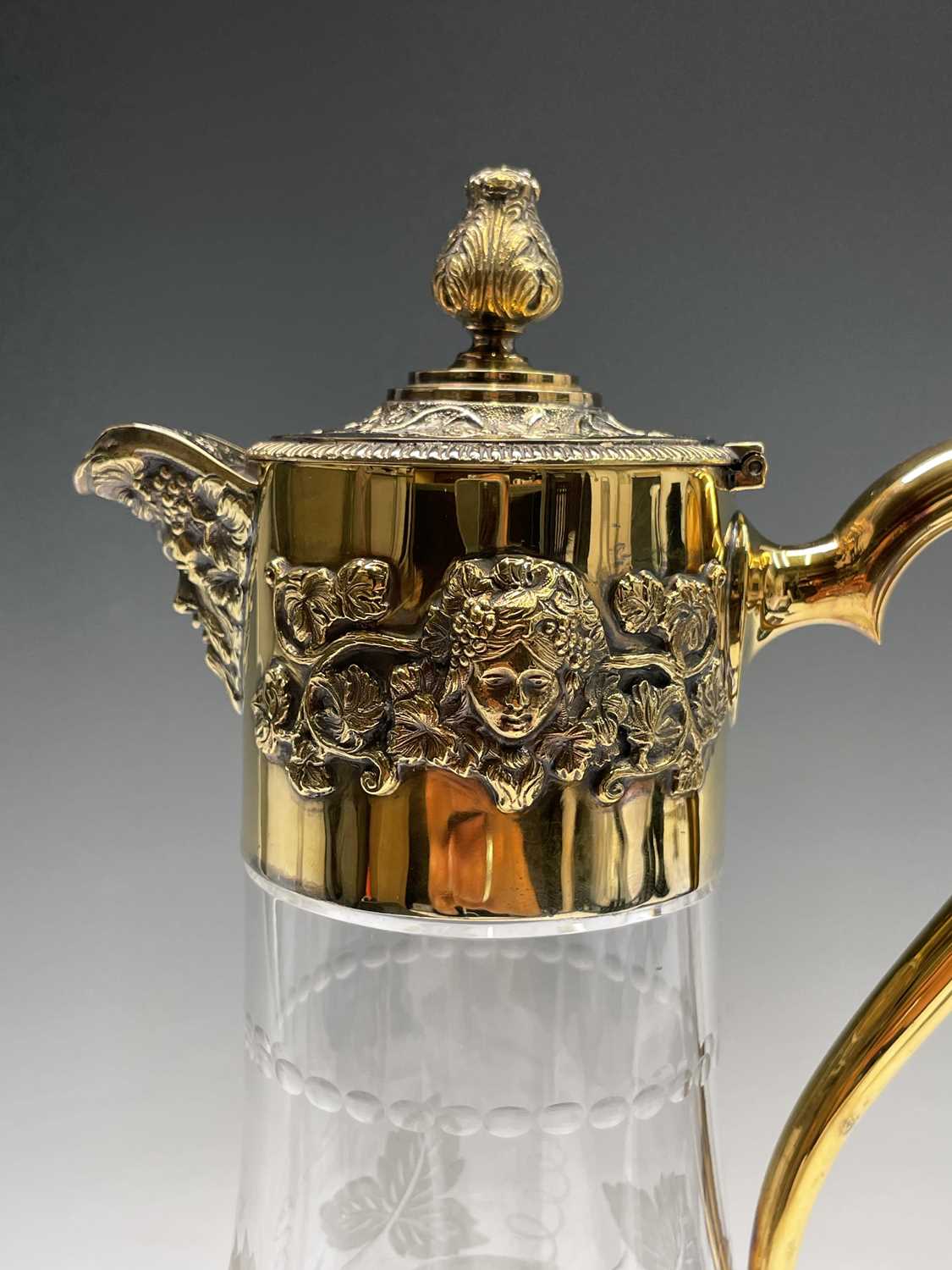 An Asprey claret jug the glass body cut and engraved with vines the silver-gilt mount with - Image 15 of 16