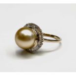 Natural golden 11.11mm South Sea pearl set in a bed of baguette diamonds in 9ct gold. Size O 4.4gm