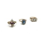 A 9ct Victorian style ring set with opals and white stones Size N and two other 9ct gold
